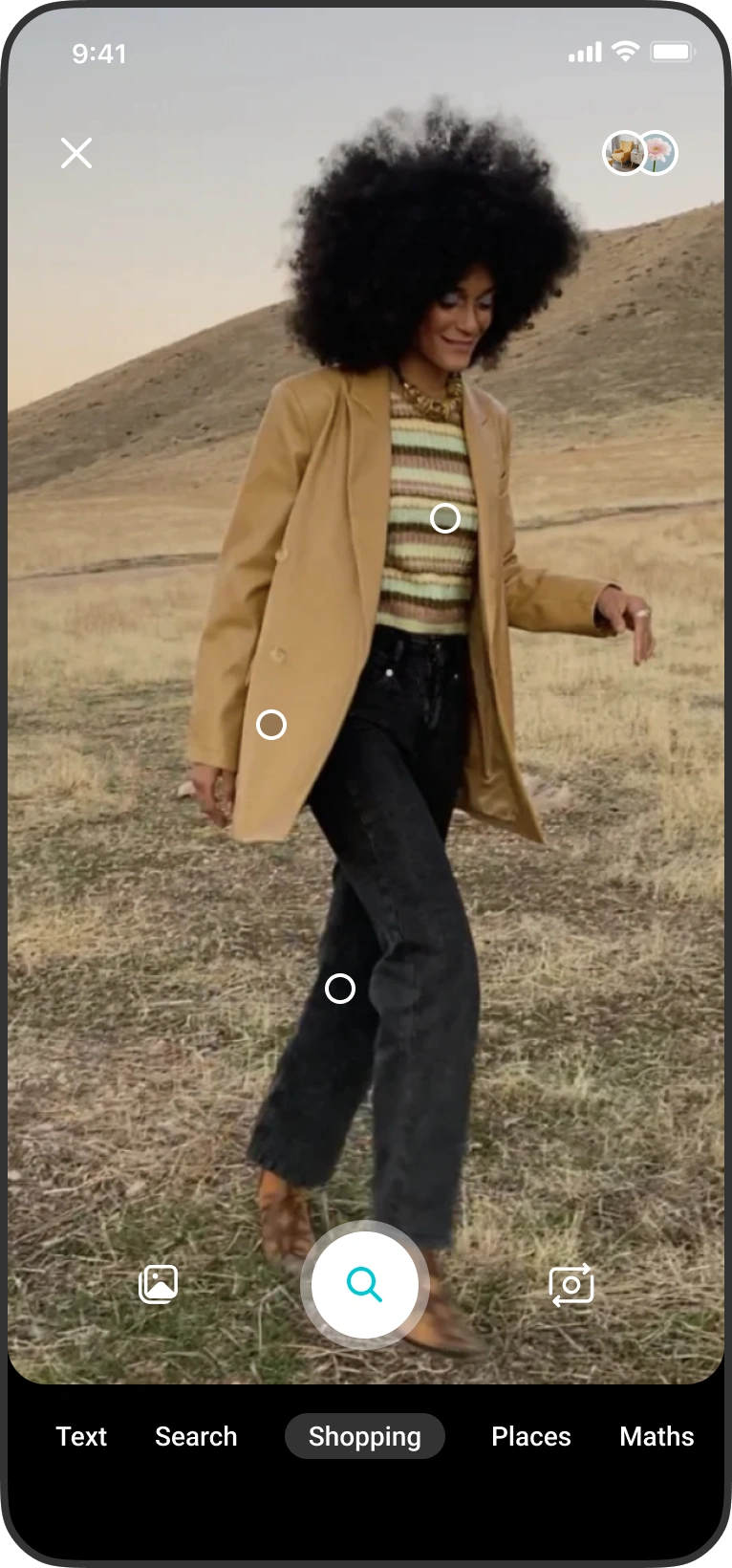 An outfit in camera view, with shoppable points marked.